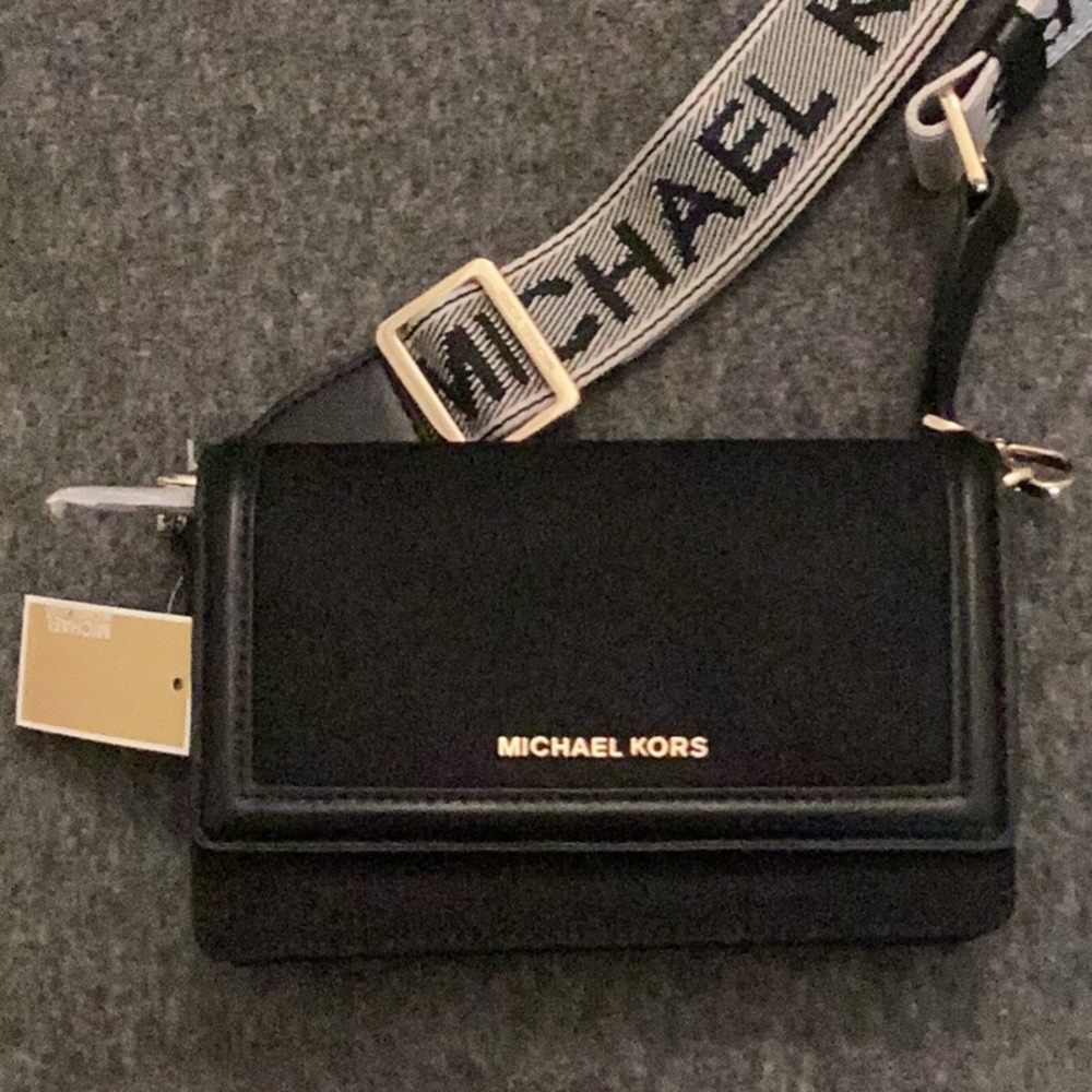 Michael Kors Black Crossbody Bag with Gold Accents and Bold Strap